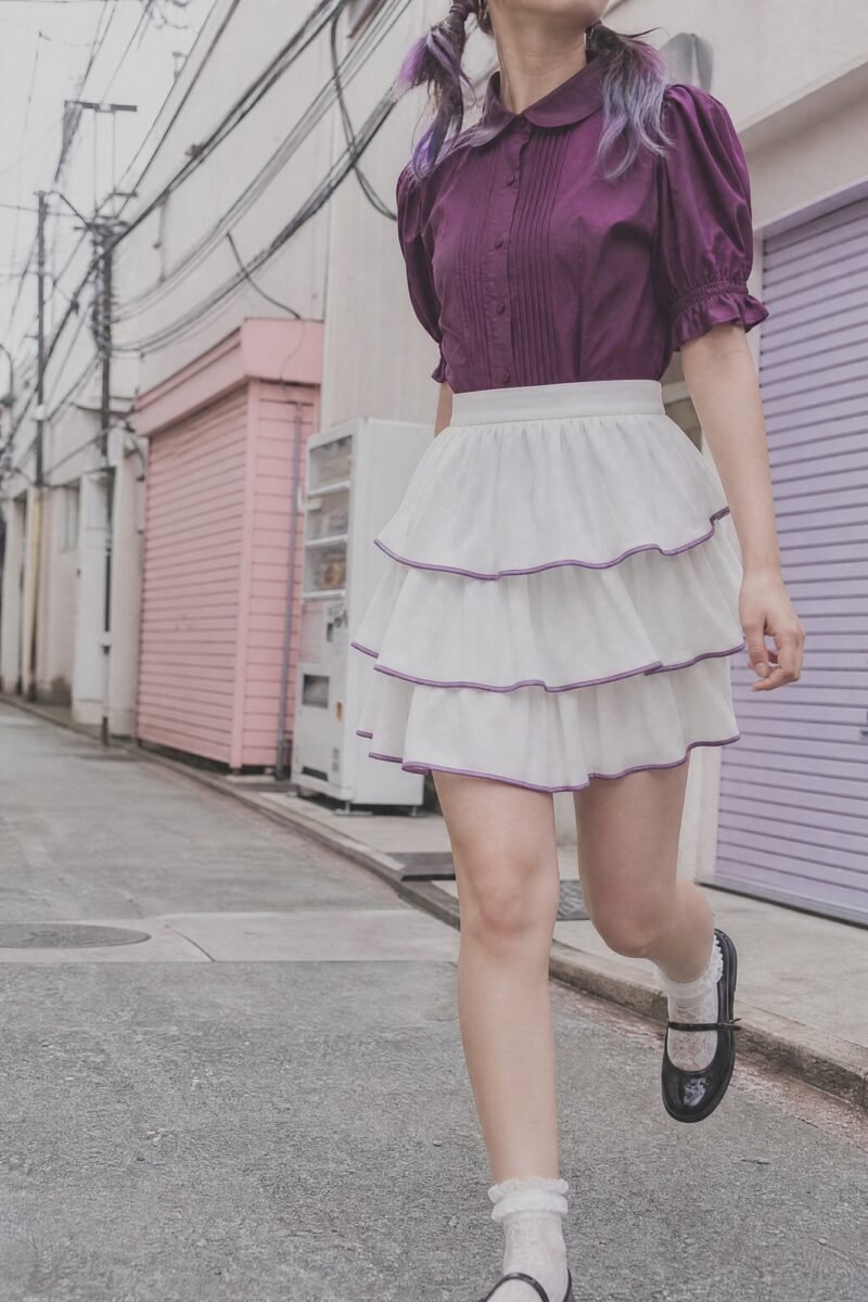 Milk Ruffle Step Skirt — Milk white with a lilac binding along every tier edge.