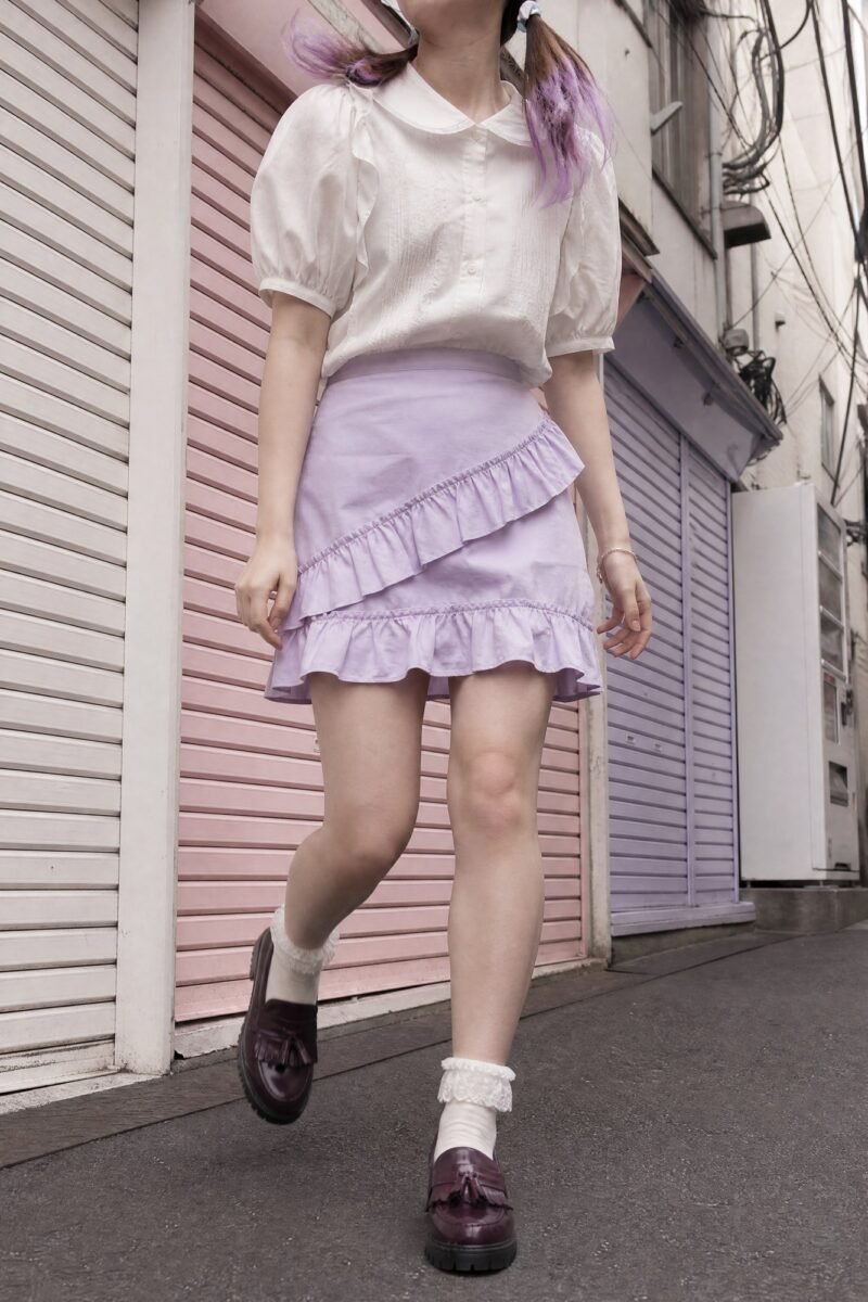 Lilac Frill Cascade Mini — Frills stitched in a diagonal cascade rather than level tiers.