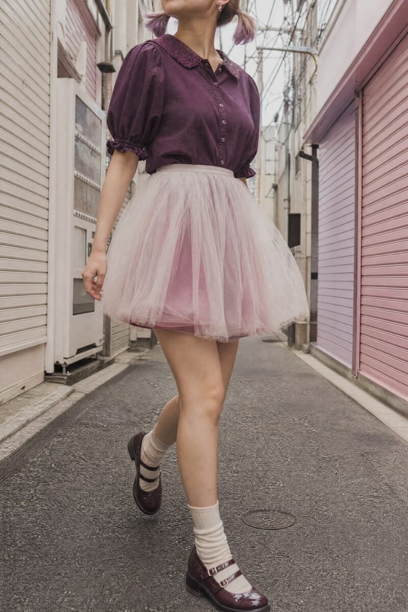 Berry Tulle Overlay Mini — A soft tulle overlay in milk white over a berry-pink lining.