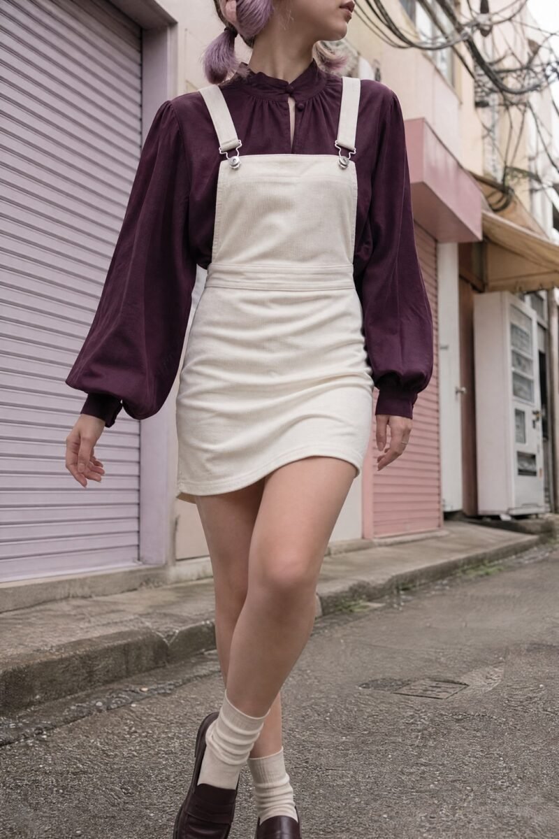 Milk Cord Strap Skirt — Milk-white fine-wale corduroy with detachable straps.
